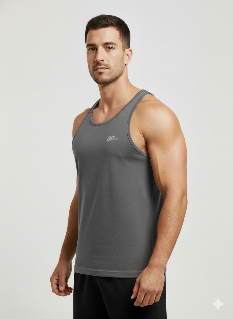 A man models the Men's Gym Clothes AU BDHQ: Racer Back Vest (180GSM) – Classic Cut, Lightweight Stretch in gray with black shorts, standing slightly angled against a plain light background, highlighting his athletic look.